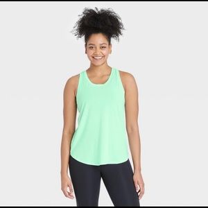 All In Motion Tanks - Lot of 4 size medium.